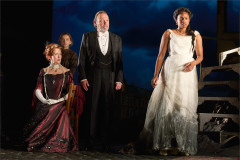 Members of the company in evening dress in An Inspector Calls, 2024 UK touring company. Photo by Mark Douet
