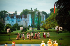 The company of Anne Boleyn: The Musical dancing in front of Hever Castle, 2025. Photo by Daniel Watson