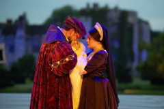 Mark Goldthorp as King Henry and Emily Lane as Anne Boleyn in Anne Boleyn: The Musical at Hever Castle, 2025. Photo by Daniel Watson