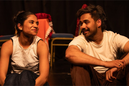The couple at the heart of Are You Even Indian?, seated on stage. Photo by Deven Ahire
