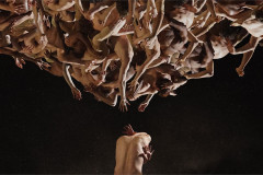 The company of BalletBoyz suspended above a lone dancer in Six Lethargies