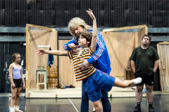 Spencer Collins (Billy) and Annette McLaughlin (Mrs Wilkinson) in rehearsal for Billy Elliot the Musical. Photo by Foteini Christofilopoulou