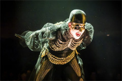 Skylar Astin as the Emcee in gold helmet and pearls. Photo by Marc Brenner