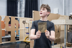 Theo Wake (Charlie Bucket) in rehearsal for Charlie and the Chocolate Factory at Curve. Photo by Marc Brenner