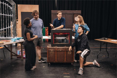 The company of Christmas Carol Goes Wrong in rehearsal. Photo by Danny Kaan