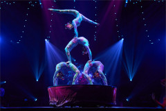 The Caterpillar contortion act forming a human tower in Cirque Alice, from an earlier staging