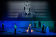 Alex Keenan as Chris Boone with the company of The Curious Incident of the Dog in the Night-Time, beneath a projected video image. Photo by Johan Persson