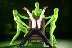 Kennedy Muntanga as the Prime Minister with the green-screen dancers in Jess &amp; Morgs: Deepfake at Sadler’s Wells East. Photo by Foteini Christofilopoulou