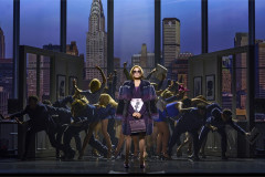 Teri Hatcher as Miranda Priestly, in a fur-trimmed coat and sunglasses, with the ensemble of The Devil Wears Prada The Musical. Photo by Matt Crockett