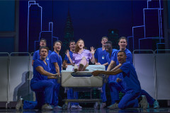 Taila Halford as Emily and the company of The Devil Wears Prada The Musical. Photo by Matt Crockett