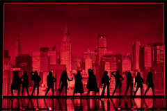 The cast of The Devil Wears Prada The Musical in silhouette against the New York skyline. Photo by Matt Crockett