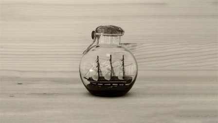 Key art for Dogstar at Hampstead Theatre: a sailing ship in a bottle
