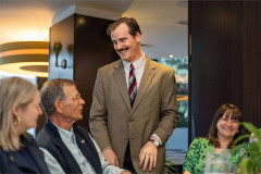 Basil chats with guests at their table at Faulty Towers The Dining Experience. Photo by That’s Up
