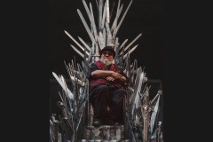 George R. R. Martin on the Iron Throne at the Royal Shakespeare Theatre, announcing the London transfer of Game of Thrones: The Mad King