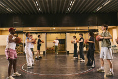 Harry Judd (centre) and the cast in rehearsals for Disney's High School Musical. Photo by Matt Crockett