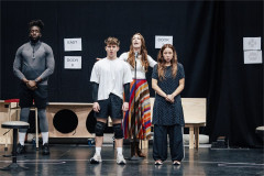 Theo Ogundipe, Vinnie Copeland, Isabel Della-Porta and Elizabeth Anderson in rehearsal for The Hunger Games: On Stage. Photo by Danny Kaan