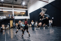 The company of The Hunger Games: On Stage rehearsing a fight sequence. Photo by Danny Kaan