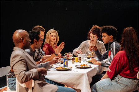 The company of Ilford Boy around the family dinner table at the Donmar Warehouse. Photo by Helen Murray