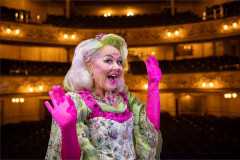 Lisa George as the Spirit of the Beans on stage at Blackpool Grand Theatre