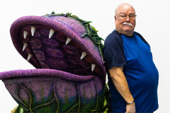 Michael Starke as Mr Mushnik meeting the Audrey II puppet in rehearsals for Little Shop of Horrors. Photo by Rosie Moore / The Social Sort