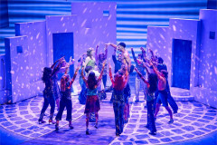 Ellie Gilbert-Grey as Sophie and Kyle Cox (centre) as Sky with the cast of Mamma Mia! at the Novello Theatre. Photo by Brinkhoff & Mögenburg