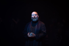 Adam Pearce as Father Dominic in Martin Guerre at the Old Vic. Photo by Helen Maybanks