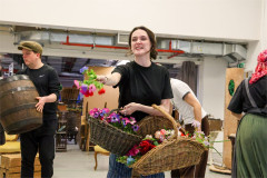 The My Fair Lady company in rehearsal with flower baskets. Photo by Chris Keatch
