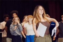 A National Youth Theatre member rehearsing with a script for Letters to My Younger Future Self. Photo by Rich Lakos