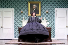 Lolly Adefope as Mary Todd Lincoln at the desk in Oh, Mary! at the Trafalgar Theatre. Photo by Manuel Harlan