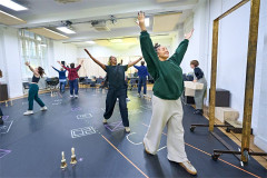 The company of A Christmas Carol dancing in the Old Vic rehearsal room. Photo by Manuel Harlan