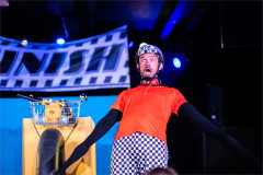 Baffo reacts to the audience in On Your Bike Baffo! Photo by Paul Blakemore