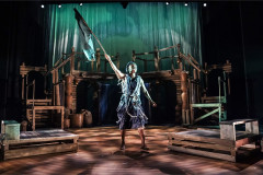 Adeola Yemitan raises a flag on the full set in Once Upon a Time in Sokoto. Photo by Tristram Kenton