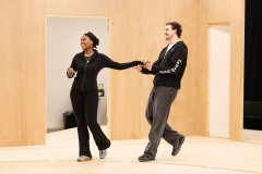 Two members of the One Day company rehearse a dance. Photo by Pamela Raith
