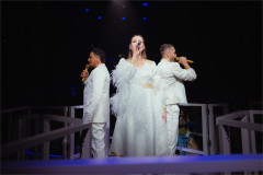 Peter Andre and fellow cast members in white performing in Mamma Mia! The Party at The O2. Photo by Grant Walker