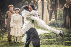 A joyful embrace in the Forest of Arden in As You Like It at the Royal Shakespeare Theatre. Photo by Marc Brenner