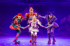 Four coaches link hands on skates in Starlight Express at the Troubadour Wembley Park Theatre. Photo by Pamela Raith