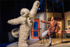 The Snowman and The Boy kick up their heels in the kitchen in The Snowman. Photo by Johan Persson
