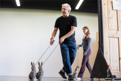 Two hare puppets are walked on leads in the rehearsal room for The Snowman. Photo by Johan Persson