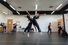 Two dancers in mid-air during rehearsals for The Snowman. Photo by Johan Persson