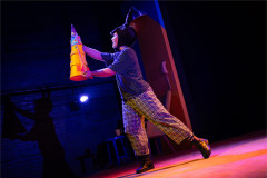 A donkey holds up a cardboard rocket in Toto at Polka Theatre