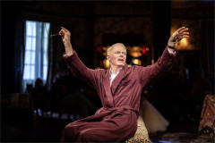 Jesse Tyler Ferguson as Truman Capote with his arms outstretched in Tru. Photo by Johan Persson