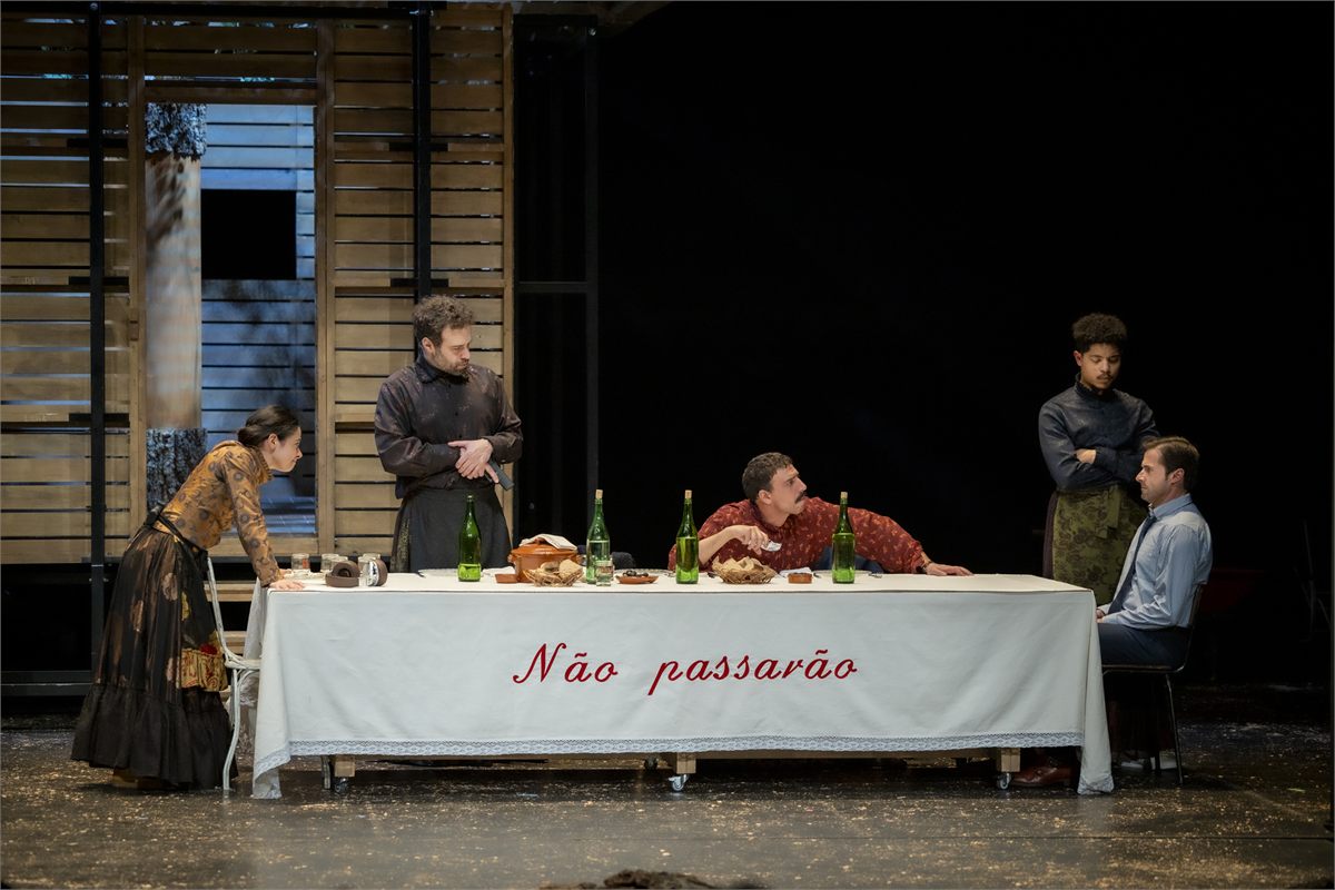 The cast of Catarina and the Beauty of Killing Fascists at the long Nao passarao table, Dorfman Theatre, National Theatre