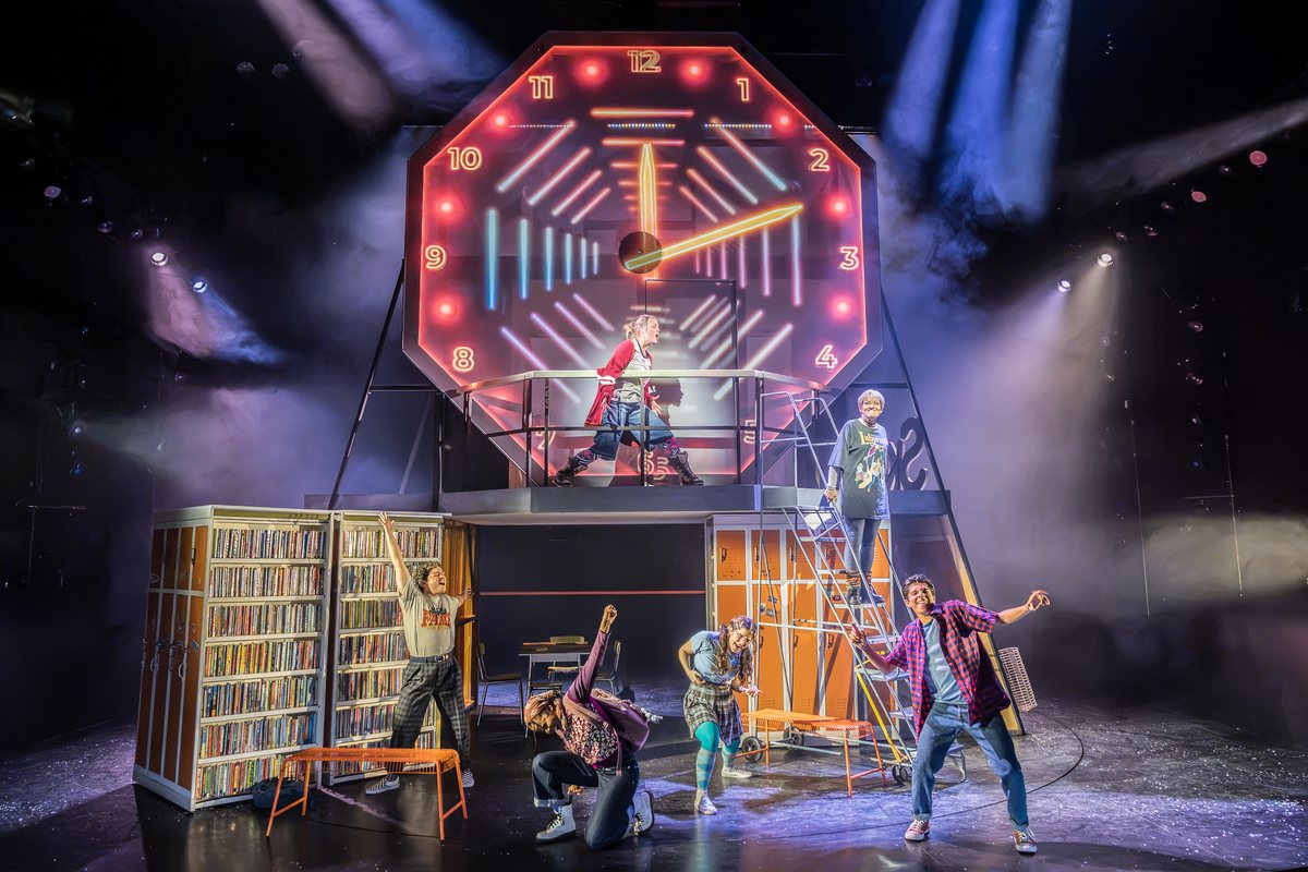 The company of Kimberly Akimbo beneath the Colgate clock at Hampstead Theatre