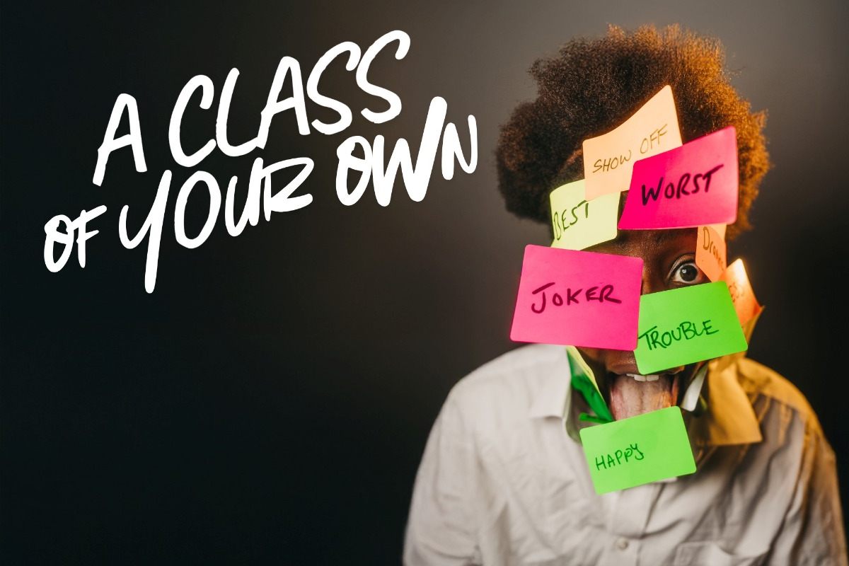 Key art for A Class of Your Own, showing a performer with sticky notes reading Joker, Trouble, Worst, Show Off and Happy covering their face