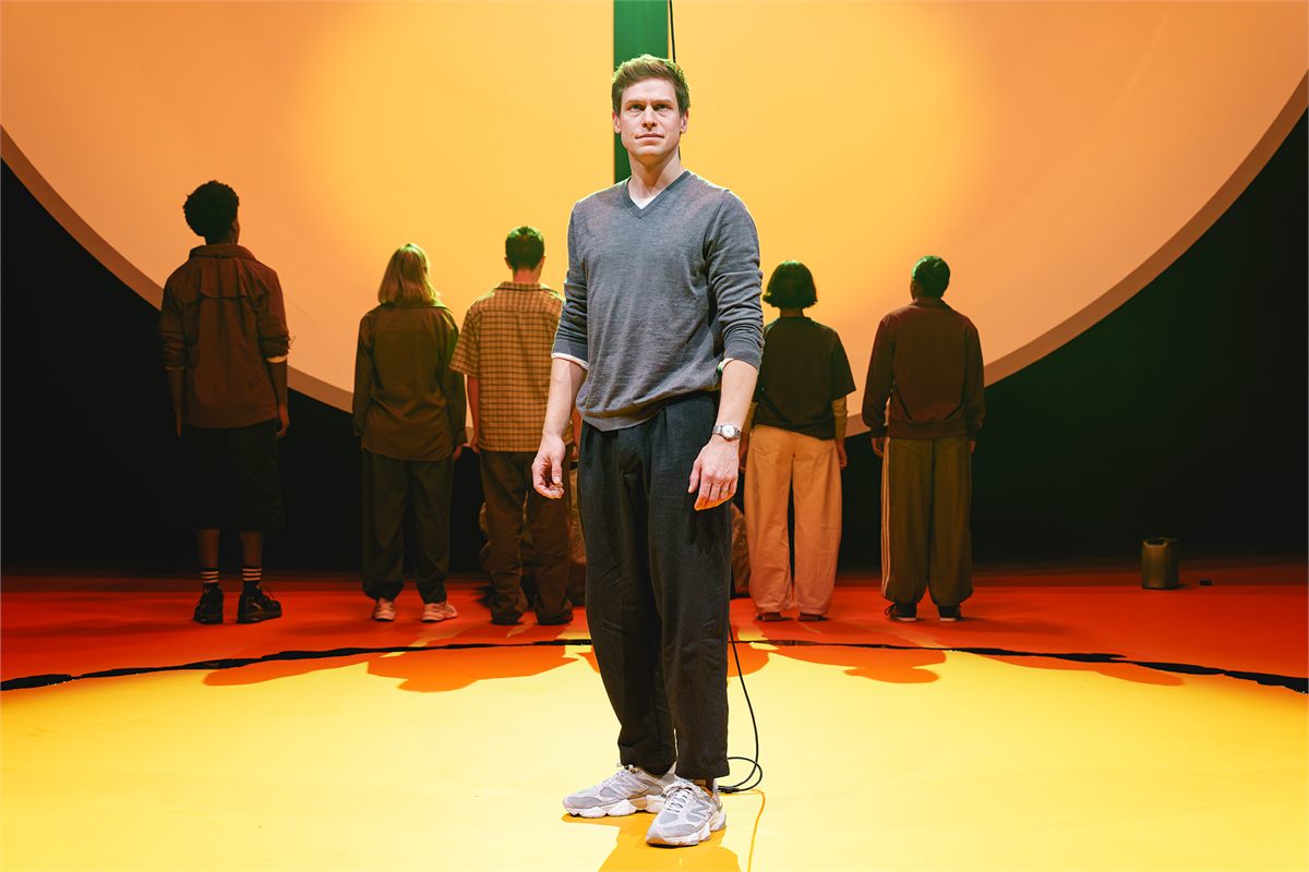Max Bennett as Creon before the company in Antigone Exits at Chichester Festival Theatre. Photo by Andy Paradise