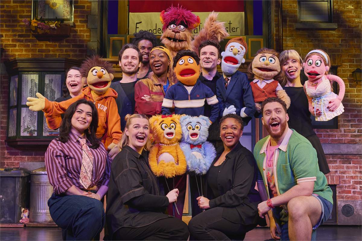 The company of Avenue Q at the Shaftesbury Theatre. Photo by Matt Crockett