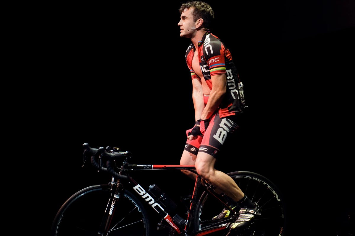 Connor Delves riding on stage as Cadel Evans in Cadel: Lungs On Legs