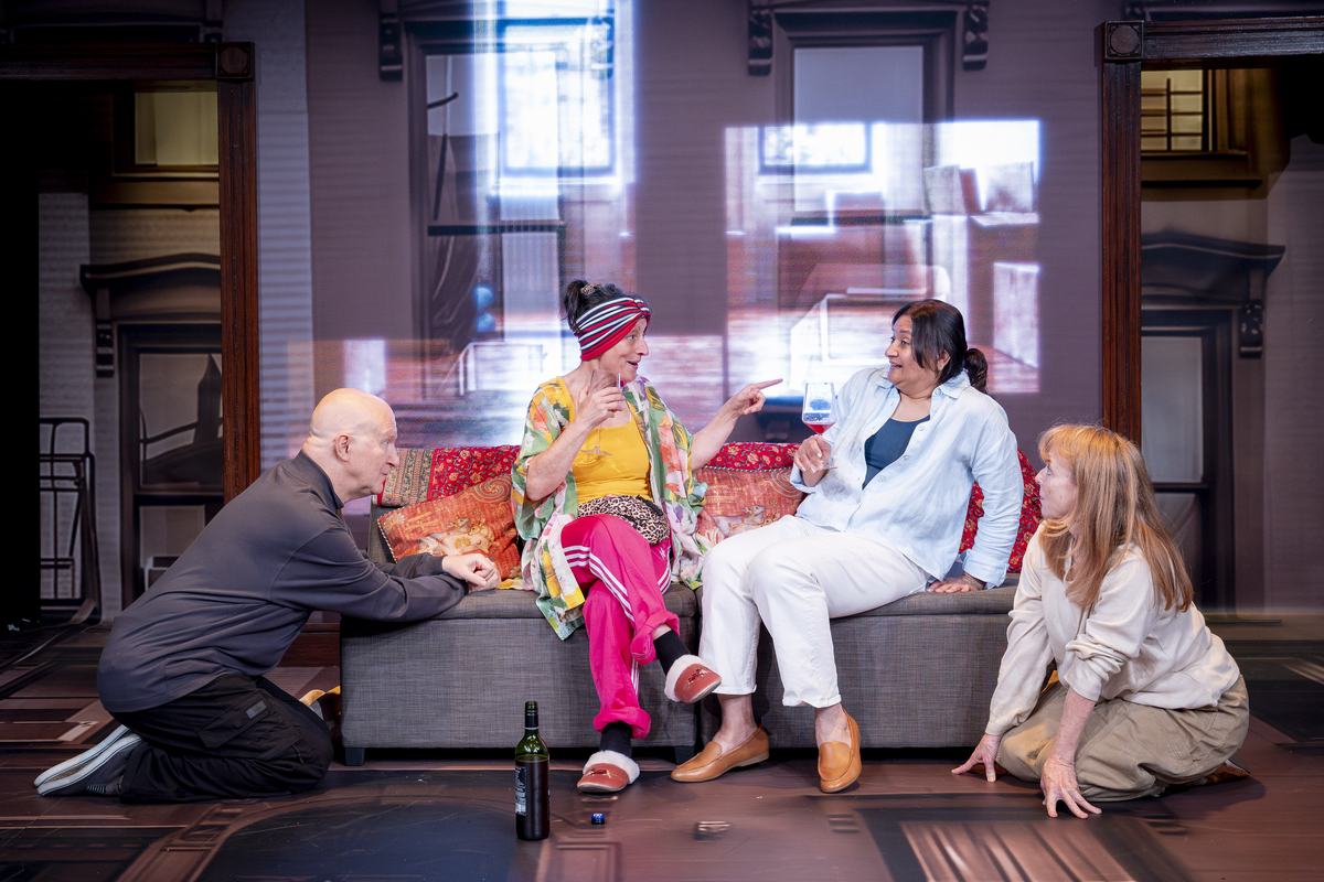 The company of Dog Mom gathered round the sofa at Southwark Playhouse Borough