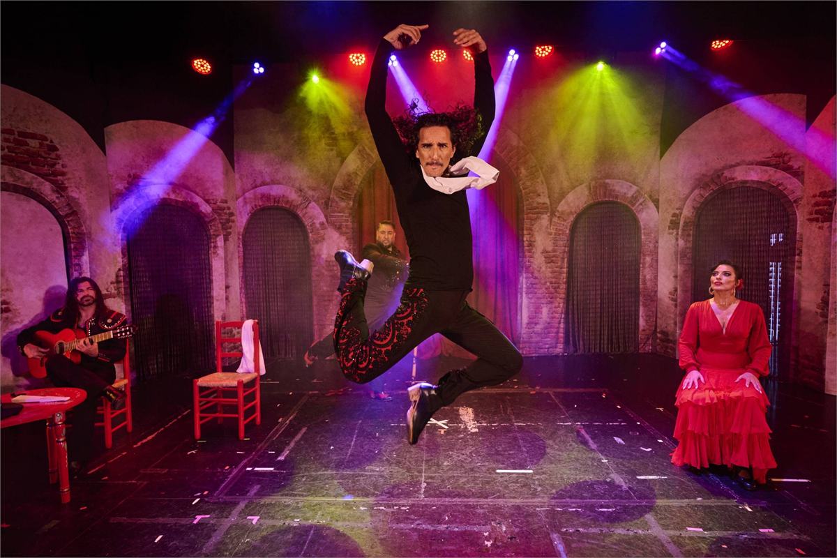 A dancer leaps in Flamenc Oh!! by Yllana at the Peacock Theatre. Photo by Pablo Lorente
