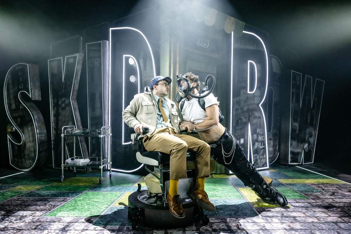 Jed Berry as Seymour and Benjamin Yates as Orin the dentist in Little Shop of Horrors at Hope Mill Theatre. Photo by Danny Kaan Jed Berry as Seymour and Benjamin Yates as Orin the dentist in Little Shop of Horrors at Hope Mill Theatre. Photo by Danny Kaan